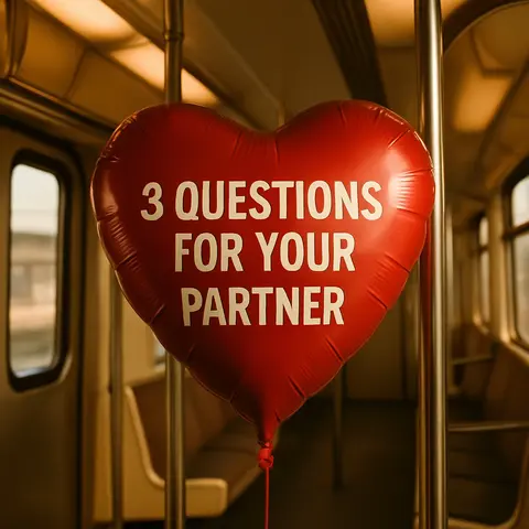 The image shows a red heart-shaped balloon with the text '3 QUESTIONS FOR YOUR PARTNER' in white, floating inside of a metro train. The train has yellow interior and windows on one side.