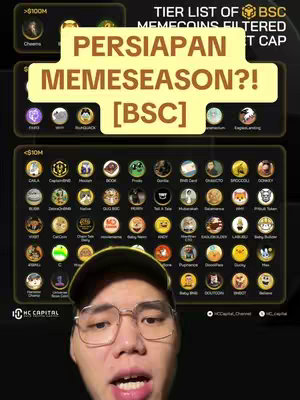 The cover image is a vertical shot featuring an Asian man in the foreground. He wears glasses, a green cap, and a dark shirt. The background is an information graphic. At the top, there's a title that reads  'TIER LIST OF BSC MEMECOINS FILTERED BY MARKET CAP'. Below this, a yellow box contains the text 'PERSIAPAN MEMESEASON?! [BSC]', which is the hook. Various circular icons with logos are arranged below, categorized into two tiers, with the top tier showing coins valued over $100M, and the bottom tier with coins under $10M. Both the background and the title's aesthetic contribute to a tech or financial vibe. The overall composition is a combination of the creator's face and informative graphics, typical of a commentary or analysis theme.