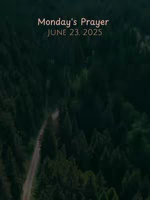 An aerial view of a dark green forest with a winding road cutting through it. Overlayed text in a light brown color reads 'Monday's Prayer' above 'JUNE 23, 2025'.