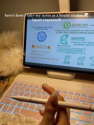 The image shows a person holding a tablet with a keyboard attached. The tablet displays handwritten notes on a science topic. The person's hand, holding a stylus, is in the foreground.