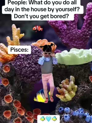 A meme-style image featuring a child as the main subject. The child is superimposed over an image of an aquarium filled with colorful coral, rocks, and various fish. Above the child is text overlayed on the image, and two speech bubbles are visible.