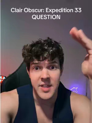 A man with short, dark hair is the central focus, positioned from the chest up. He has a furrowed brow and wide eyes, suggesting surprise or concern. He wears a dark blue sleeveless top. His left arm is raised, with the hand pointing upward, as if making a point or indicating a question. Behind him, a blurred background includes a gaming chair and a neon unicorn light, and a computer screen at the left.