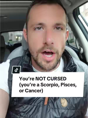 A man sits in a car, looking directly at the camera. A white rectangle with black text is superimposed over the bottom portion of the image.