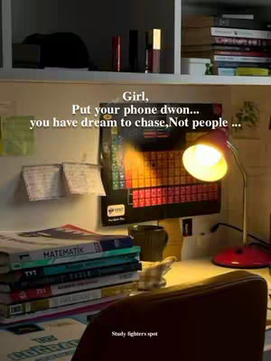 The image shows a desk setup with books, stationery, and a lamp. The text overlay reads, "Girl, Put your phone down... you have dream to chase, Not people ..." It's a motivational image for studying.