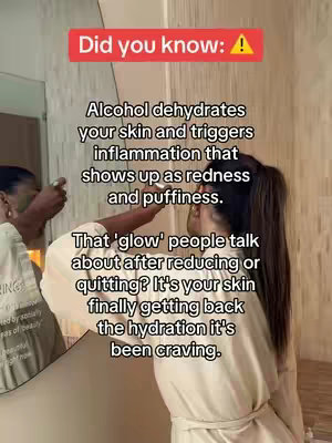 A woman is shown from the chest up, positioned on the right side with a mirror reflecting parts of her body and the bathroom setting. She wears a light-colored robe. Text overlays in the upper portion provide health information.