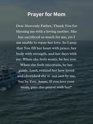 The image shows a serene view of water with a boat in the distance and a text overlay in the center. The text is a prayer dedicated to a mother.