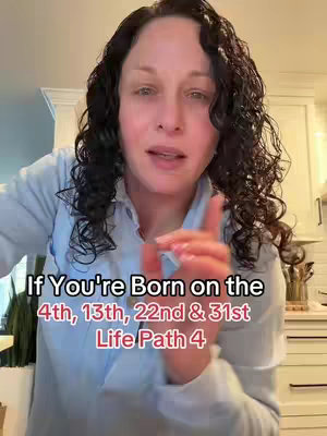 A woman with dark curly hair is in a kitchen, looking at the camera and gesturing with her index finger. Text overlays show the dates and "Life Path 4".
