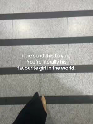 An overhead shot of light gray stairs with dark gray lines. The text overlayed says " if he send this to you, You're literally his favourite girl in the world.". In the bottom corner, there is a black jacket.