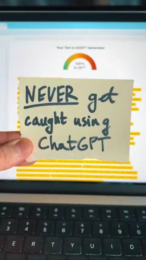 A close-up shot of a laptop screen displaying the results of an AI detection test, with an off-white sticky note in front. The sticky note, held by a hand, has handwritten text that says, "NEVER get caught using Chat GPT". The background shows analysis results with a colorful graph and text. The laptop keyboard is visible at the bottom.