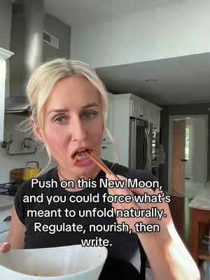 A medium shot shows a woman in a kitchen, with the focus on her face as she holds up food with chopsticks. The text overlay is centered above her chest. The background shows a bright, modern kitchen.