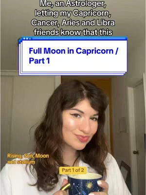 A woman with dark hair, wearing a white shirt, smiles while holding a mug. Text overlays include astrological information and the video's title. The background appears to be a room with a window and additional framed artwork reflecting a casual setting.