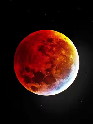 The image is a digital illustration of a total lunar eclipse. A large, spherical moon dominates the central portion of the image, showing a deep red color with varying shades of orange and yellow, indicating different stages of the eclipse. The moon's surface details are visible, with shadowed regions and textured areas. The background is a solid black, and small, white stars are scattered across it. The overall composition is a dramatic visual representation of the eclipse, using color and contrast to emphasize the celestial event.