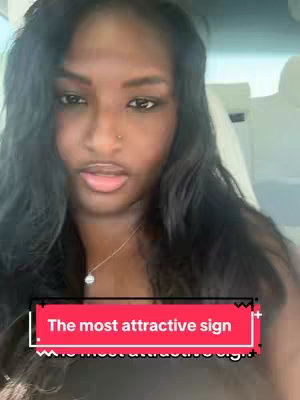 A selfie-style shot featuring a woman with dark hair and a light complexion. She's positioned in a car, with the interior visible as a backdrop. The image is front-facing, focusing on the woman's face, with a text overlay at the bottom.