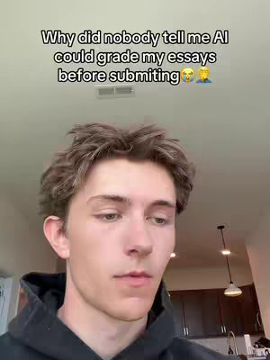 A young man with light brown hair, wearing a black hoodie, looks down pensively. The background is a light-colored wall with visible overhead lighting and a hint of a dark cabinet, suggesting an indoor domestic setting. Overlay text in white describes the video's subject.