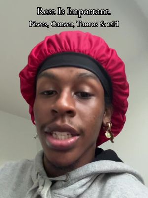 A man with dark skin is centered in the frame. He wears a red bonnet and a gray hooded sweatshirt. The text overlay reads 'Rest Is Important. Pisces, Cancer, Taurus & 12H'.