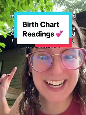 A selfie-style shot featuring a smiling person wearing glasses. They are bathed in natural light, likely outdoors. A rectangular overlay provides the video title 'Birth Chart Readings' with two pink hearts.