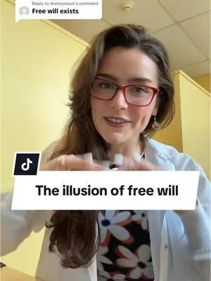 A woman with long wavy brown hair and glasses is the central focus in a selfie-style video cover image. She's wearing red-rimmed glasses. A white banner with the text "The illusion of free will" floats below them.