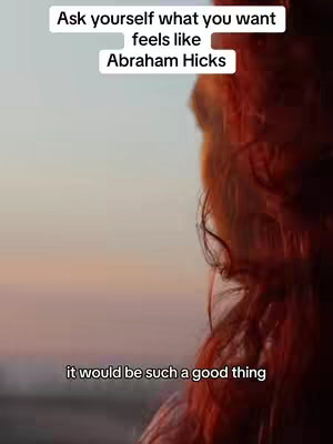 A woman with long auburn hair is the main focus, seen from the back and side. The background is a blurred sunset with pale oranges and blues. Text overlays in white boxes with black text quotes Abraham Hicks.