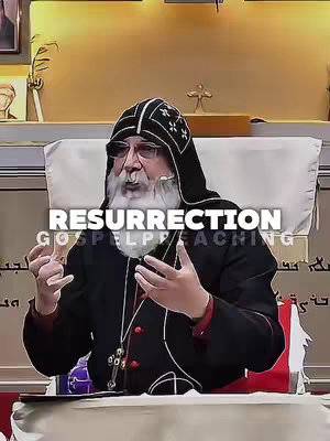 The image features a man, presumably a religious figure, seated and gesturing with his hands. He is dressed in dark robes and a black headdress, with a white beard. The background includes a golden-colored wall with a cross and other religious symbols. The text overlay on the image says 'Resurrection Gospel Preaching'.