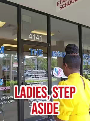 The cover image shows a woman in a yellow top, viewed from the back, with a dark hairstyle, standing in front of a glass door. The text overlay, "LADIES, STEP ASIDE", is in bold red font.