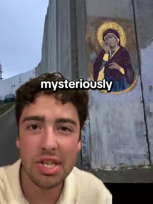 A man stands in front of a weathered wall, with artwork of the Virgin Mary painted on it. The word "mysteriously" is superimposed on the image in white text.
