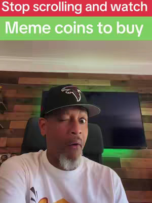 A man is winking at the camera with "Stop scrolling and watch Meme coins to buy" at the top.