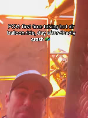 The image shows a man looking at the camera inside what seems to be the basket of a hot air balloon. The lighting is warm and yellow inside. Text overlay describes the situation.