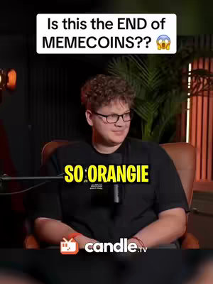 The cover image shows a man behind a microphone in a studio setting. The man is wearing glasses and a black shirt. Above is the question "Is this the END of MEMECOINS??" in white text inside a black box. Below the man says "SO: ORANGIE" in yellow text inside a black box.