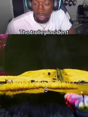 The cover image is split into two sections. The top half shows a person wearing headphones and looking at the camera with a concerned expression. White text is overlaid on this top section. The bottom half is from a first-person perspective of a video game featuring a path, fence and a landscape.