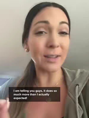 A woman with dark hair pulled back in a low ponytail is speaking to the camera. She is wearing a gray hoodie and a necklace. A text box is superimposed that speaks to the video’s content: I am telling you guys, it does so much more than I actually expected!