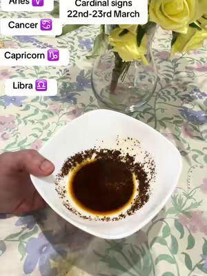 A hand holding a white square bowl with coffee grounds and liquid in the center. Other elements include flowers, text and sign images.