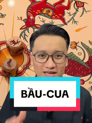 A man with glasses smiles in front of a colorful background with dice and the text "BẦU-CUA".