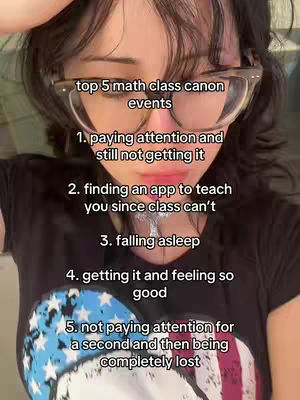 The cover image is a selfie-style shot featuring a young person wearing glasses and a black top. The individual's face is the primary focus, with text overlayed, listing "top 5 math class canon events." The background is slightly blurred, emphasizing the list and the person's face. The text is in white and is placed at a slight angle.