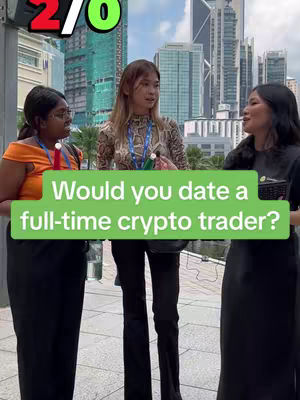 Three women are standing on a city street, likely being interviewed. A green banner overlayed with the question "Would you date a full-time crypto trader?" is visible. The background includes tall buildings and signs of urban activity.