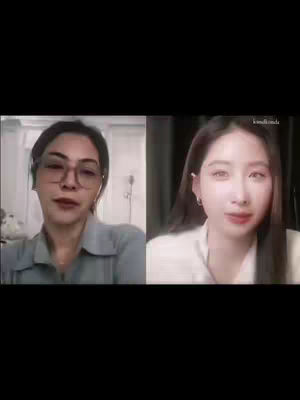 The image shows two women. The one on the left side is wearing glasses and a gray top. The background is light with a glimpse of what appears to be a kitchen. The woman on the right is wearing a white collared shirt, and the background is darkened, possibly with curtains.