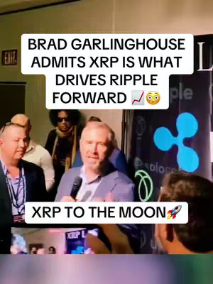 The cover image shows a man speaking into a microphone, likely in a conference or meeting setting. Overlay text provides additional context. The background includes additional people and a logo with an XRP design.