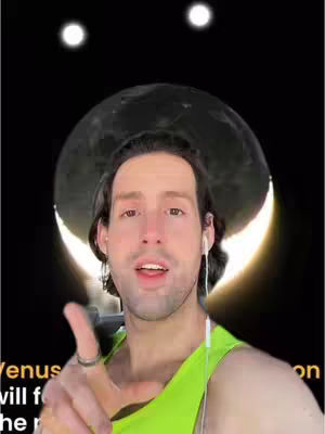 A man with dark hair and a green shirt is pointing at the camera, with a partial moon and two star-like lights in the background. The background is a dark black. Text is overlaid in white, partially obscured by the man.
