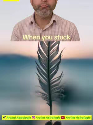 The image features a man in the upper section with the text overlay: "When you stuck" over his head. Below the man's chest, a large, detailed feather is the main subject. The background transitions from a blurry turquoise and blue, suggesting sky and water.