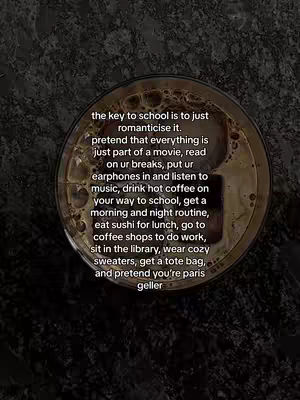 A close-up shot of a glass of iced coffee, with a surface that looks like a dark, textured countertop in the background. Overlaid on the image is a block of text with white font on black rectangle.