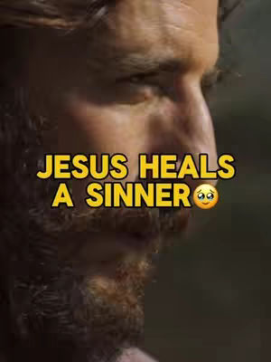 Close-up of a man's face with a beard; overlaid text reads, "JESUS HEALS A SINNER", along with a yellow text box, with the added crying emoji, which is a visual cue to show sadness or hurt. The background appears to be a natural environment, enhancing the overall scene's somber tone.