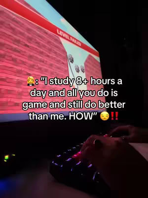 The cover image shows a person's hands on a backlit mechanical keyboard with a computer monitor displaying a video game background in the background. Text overlays the monitor, and includes the phrase: "I study 8+ hours a day and all you do is game and still do better than me. How?"