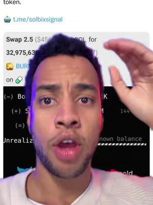 A close-up shot of a Black man with short, dark hair, eyes wide open, and his mouth slightly open as if he's speaking. His right hand is raised, as if he's gesturing or reacting to something. The background includes a display of information in a white box.