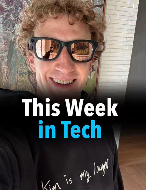 A selfie-style cover image featuring a young man wearing black sunglasses, smiling at the camera. The sunglasses reflect the room, and the man is wearing a black hoodie with handwritten text visible across the chest. Superimposed text spells out "This Week in Tech" in bold white font with a blue highlight.