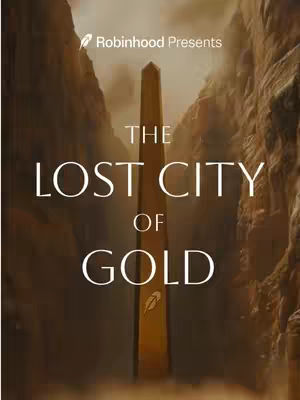 An image depicts a tall, golden obelisk centered between two rugged, brown cliff faces. The sky above the obelisk is a hazy, muted shade. White text is overlaid, reading 'THE LOST CITY OF GOLD'. At the top left, surrounded by a white background is the words 'Robinhood Presents.' Below the words 'of Gold' appears a logo.