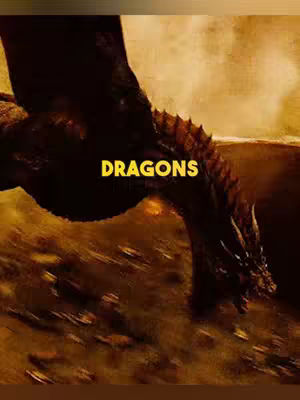 The cover image shows a digital illustration of a dragon. The dragon's head and parts of its wings are visible. The dragon has a dark, scaled appearance. The word 'DRAGONS' is written in yellow with a black outline.