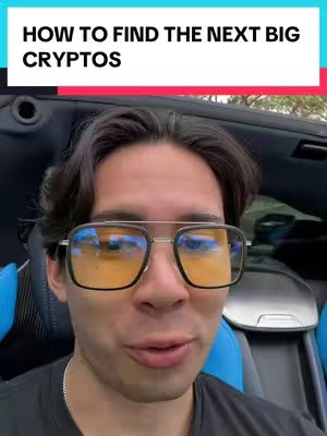 A man with dark hair and glasses looks directly at the camera in what looks like the front seat of a car. The text overlay in the top left corner of the screen reads, 'HOW TO FIND THE NEXT BIG CRYPTOS'.