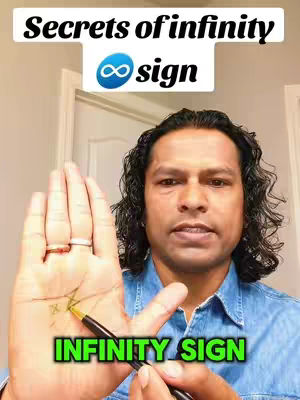 A man with dark curly hair holds out his hand, displaying lines drawn on his palm with a pen. The image is framed from chest-up, in front of a neutral background. Text overlays are added at the top and bottom.