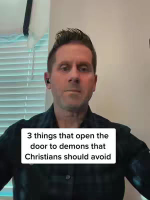 A man with short brown hair and a beard stands in front of a blurred background with a text overlay saying '3 things that open the door to demons that Christians should avoid'. He is wearing a dark-colored check shirt.