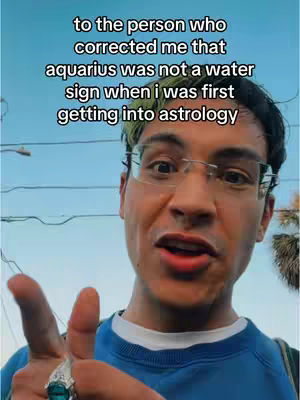 A man with glasses and a blue shirt is shown in a selfie-style video, with hook text overlaid at the top.