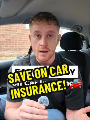 A man is sitting in a car with a microphone in his hand. He faces the camera with an open mouth, behind a text overlay that reads "SAVE ON CAR INSURANCE!". The foreground and background are somewhat blurred to focus on the subject.